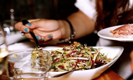 woman eating vegetables